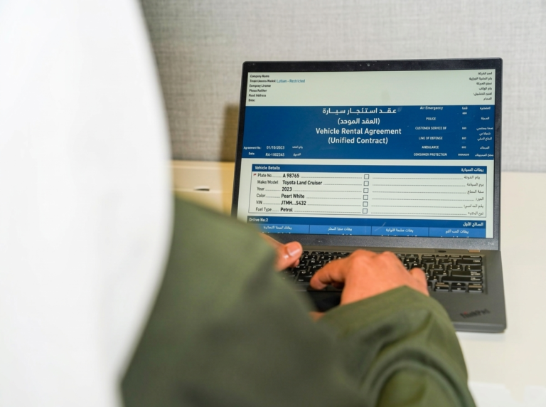 Car rental office in Dubai implementing RTA unified contract